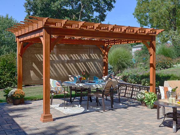 A wooden pergola with easy curtains