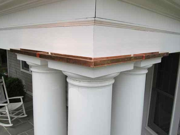 Copper flashing is a distinctive architectural detail